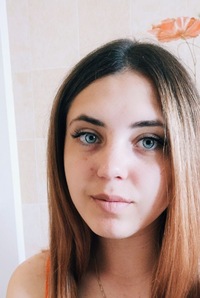 Оля Тихонова