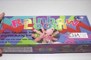 Unwrapping my Rainbow Loom® kit super fun rubber band bracelet making kit. Opening the new toy box