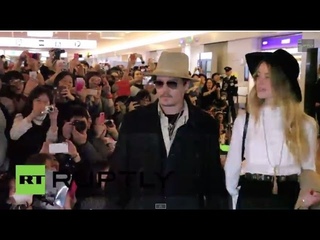 Japan: Johnny Depp and fiancee Amber Heard greet fans in Tokyo
